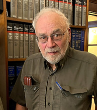 John A. White, Jr. in the White Law Chartered office